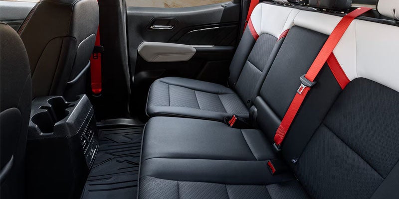 Rear seating area of the 2026 GMC Canyon highlighting passenger comfort and safety