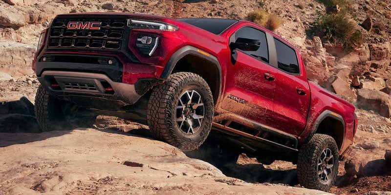 2026 GMC Canyon demonstrating off-road performance on rugged terrain in Kewanee, IL
