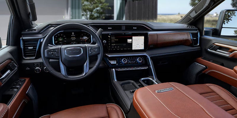Premium interior of the 2026 GMC Sierra 2500 HD SLT with leather seating and spacious cabin
