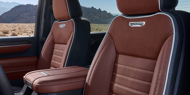 Premium leather front seats inside the 2026 GMC Sierra 2500 HD AT4X