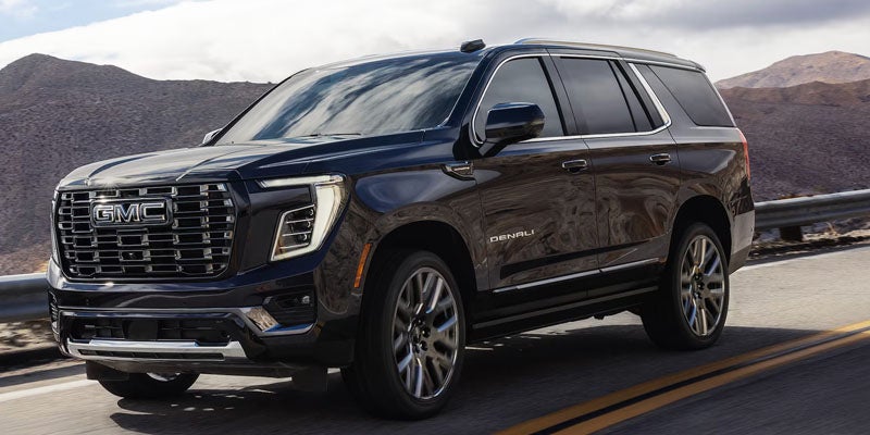 2026 GMC Yukon XL showcasing available trim levels and bold exterior styling