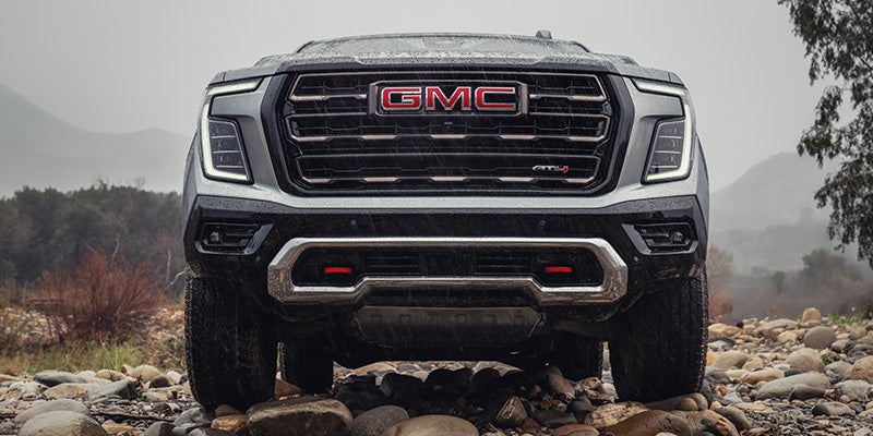 Front view of the 2026 GMC Yukon XL highlighting its signature GMC grille and premium design