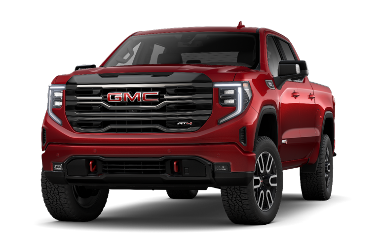 Red GMC Sierra pickup truck shown from a front three-quarter angle